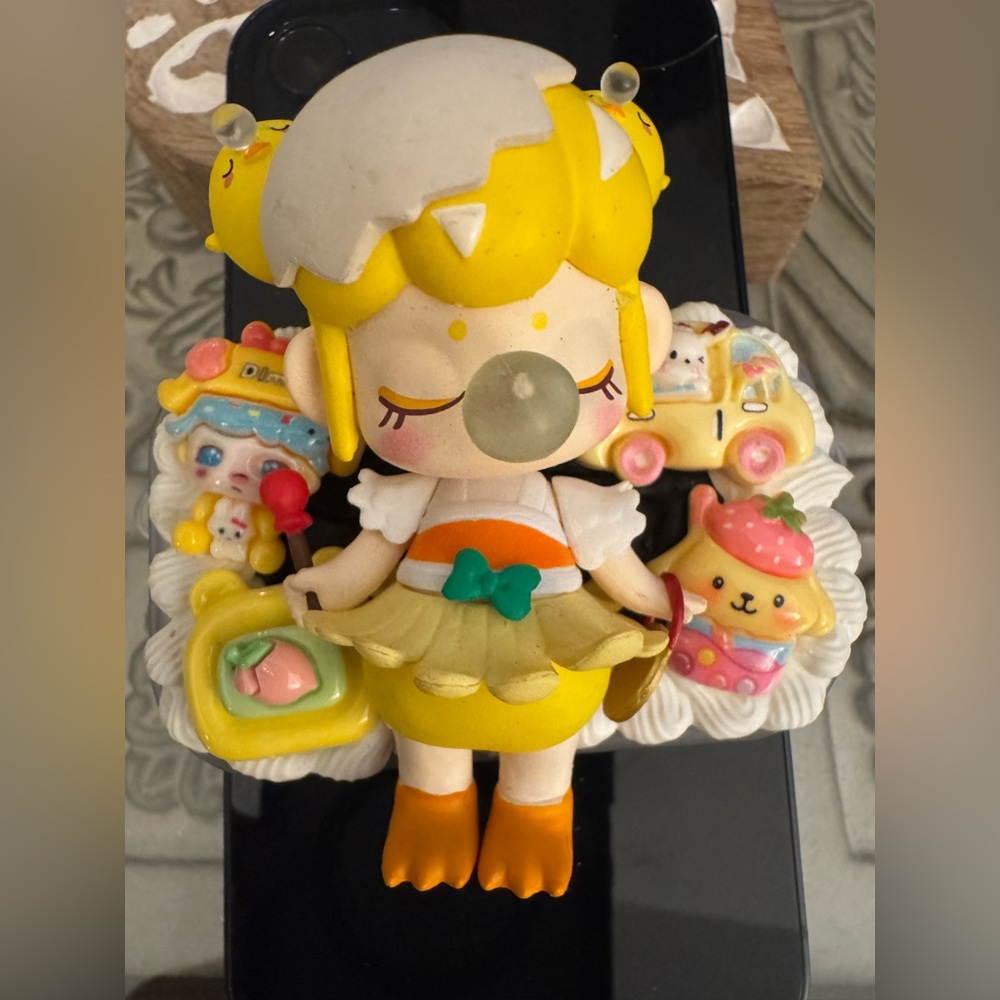 New Cute Yellow Bubblegum Girl Figurine with Pastel Accent phone clip